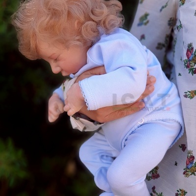 Boneca reborn menino Hugo, recém-nascido com cabelo enraizado, pesado 2kgs, em uma bolsa de transporte, corpo de pano com cabeça flexível realista, presente ideal para meninas