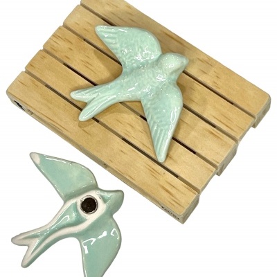 Andorinha&#x20;em&#x20;cer&#x00E2;mica&#x20;c&#x2F;&#x20;&#x00ED;man