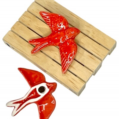 Andorinha&#x20;em&#x20;cer&#x00E2;mica&#x20;c&#x2F;&#x20;&#x00ED;man