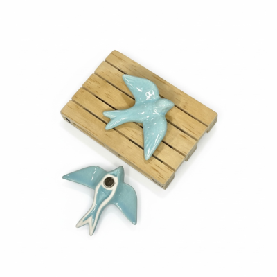 Andorinha&#x20;em&#x20;cer&#x00E2;mica&#x20;c&#x2F;&#x20;&#x00ED;man