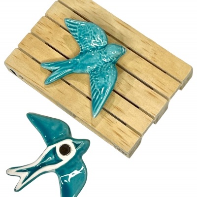 Andorinha&#x20;em&#x20;cer&#x00E2;mica&#x20;c&#x2F;&#x20;&#x00ED;man