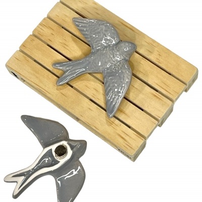 Andorinha&#x20;em&#x20;cer&#x00E2;mica&#x20;c&#x2F;&#x20;&#x00ED;man