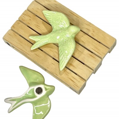 Andorinha&#x20;em&#x20;cer&#x00E2;mica&#x20;c&#x2F;&#x20;&#x00ED;man