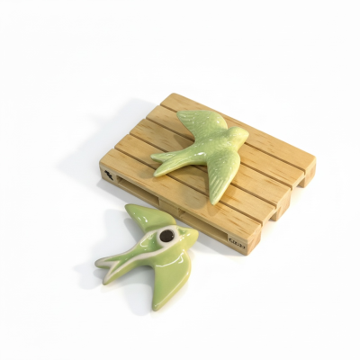 Andorinha&#x20;em&#x20;cer&#x00E2;mica&#x20;c&#x2F;&#x20;&#x00ED;man