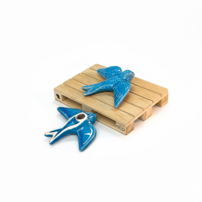 Andorinha&#x20;em&#x20;cer&#x00E2;mica&#x20;c&#x2F;&#x20;&#x00ED;man