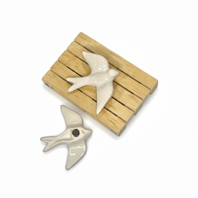 Andorinha&#x20;em&#x20;cer&#x00E2;mica&#x20;c&#x2F;&#x20;&#x00ED;man