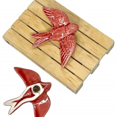 Andorinha&#x20;em&#x20;cer&#x00E2;mica&#x20;c&#x2F;&#x20;&#x00ED;man