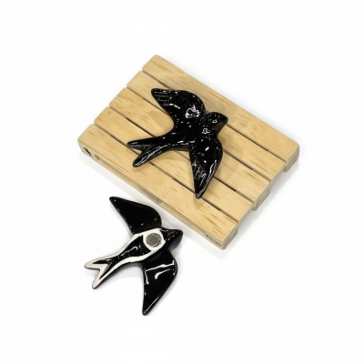 Andorinha&#x20;em&#x20;cer&#x00E2;mica&#x20;c&#x2F;&#x20;&#x00ED;man