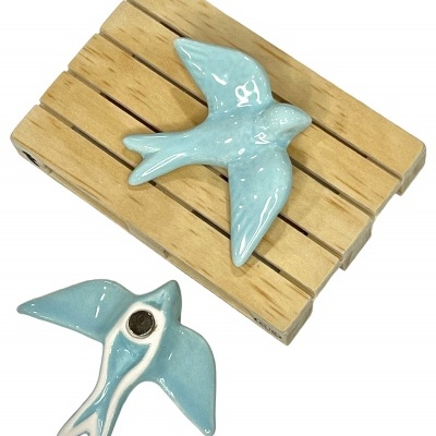 Andorinha&#x20;em&#x20;cer&#x00E2;mica&#x20;c&#x2F;&#x20;&#x00ED;man