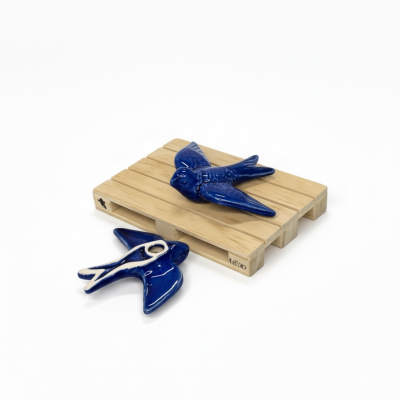 Andorinha&#x20;em&#x20;cer&#x00E2;mica&#x20;c&#x2F;&#x20;&#x00ED;man