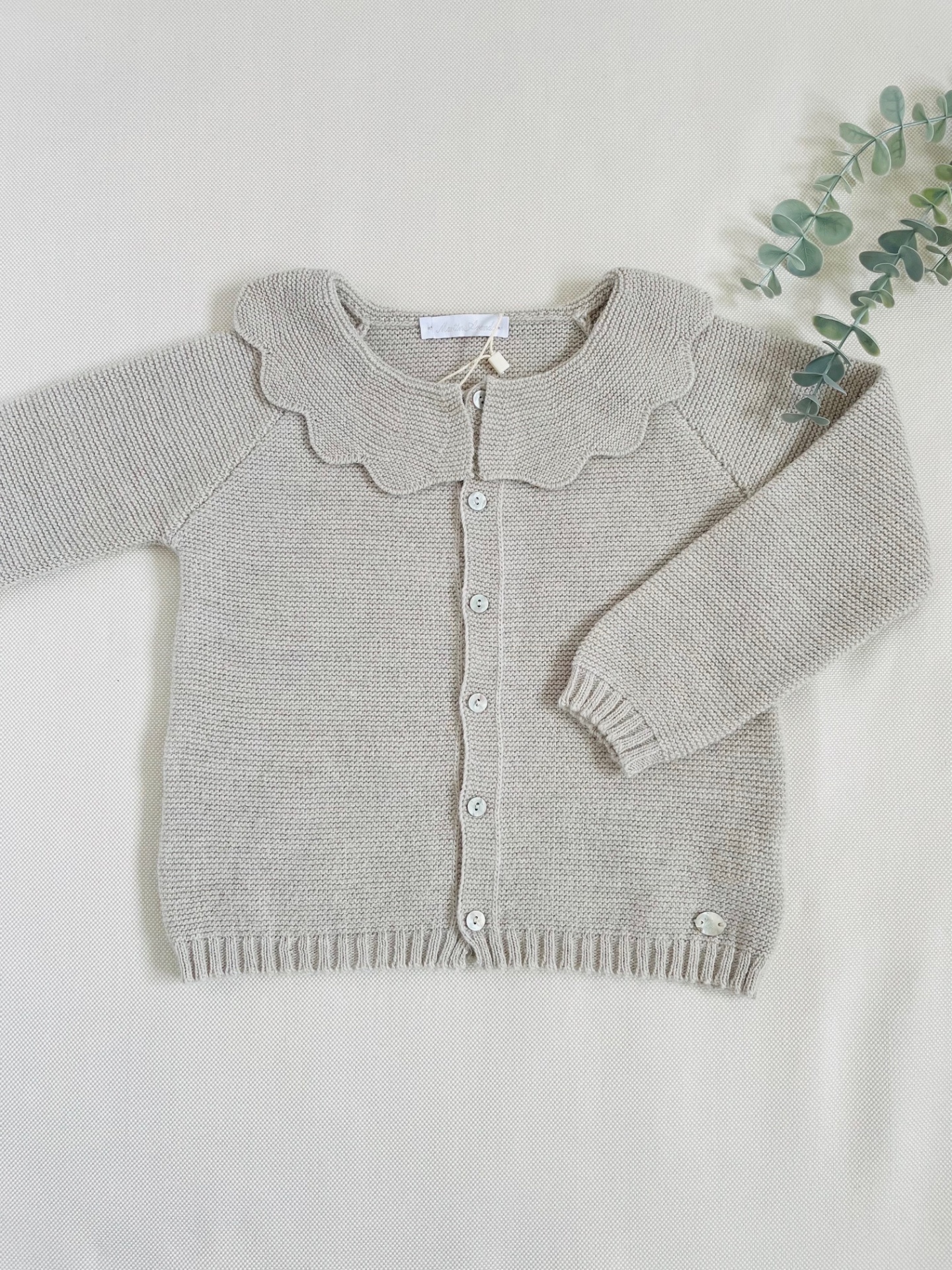 Casaco malha com gola