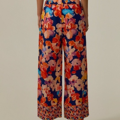 Calças fluidas padrão floral Decenio