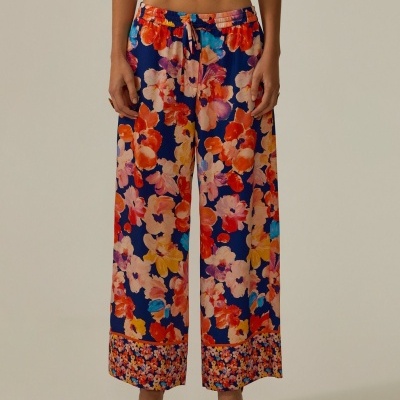 Calças fluidas padrão floral Decenio