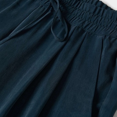 Calças em cupro Decenio