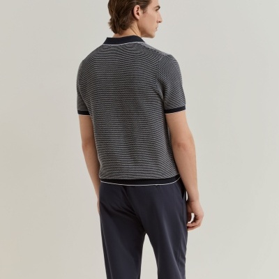 Polo de manga curta em malha de algodão Lion of Porches