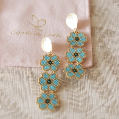 Brincos flores