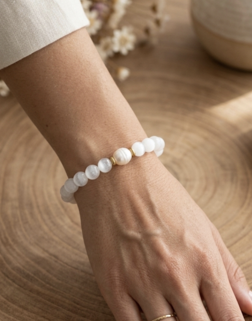 Pulseira de selenite com pérola