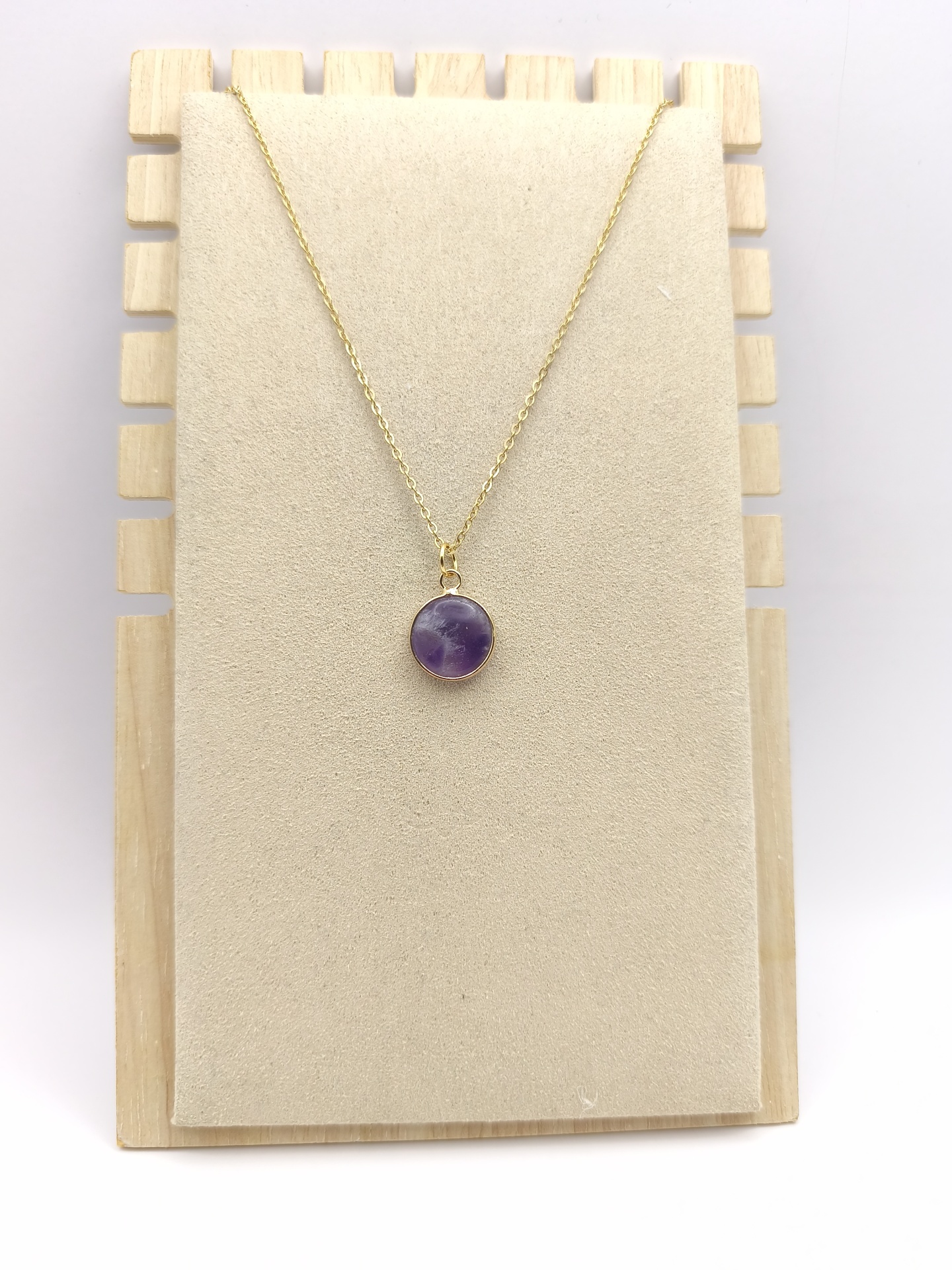 Colar em aço com pingente de ametista