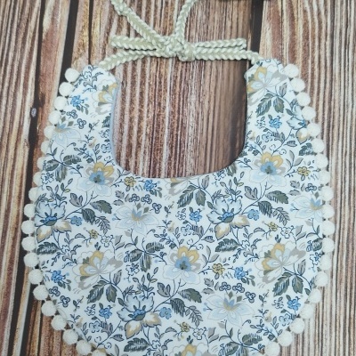 Babete reversível "Flores" azul