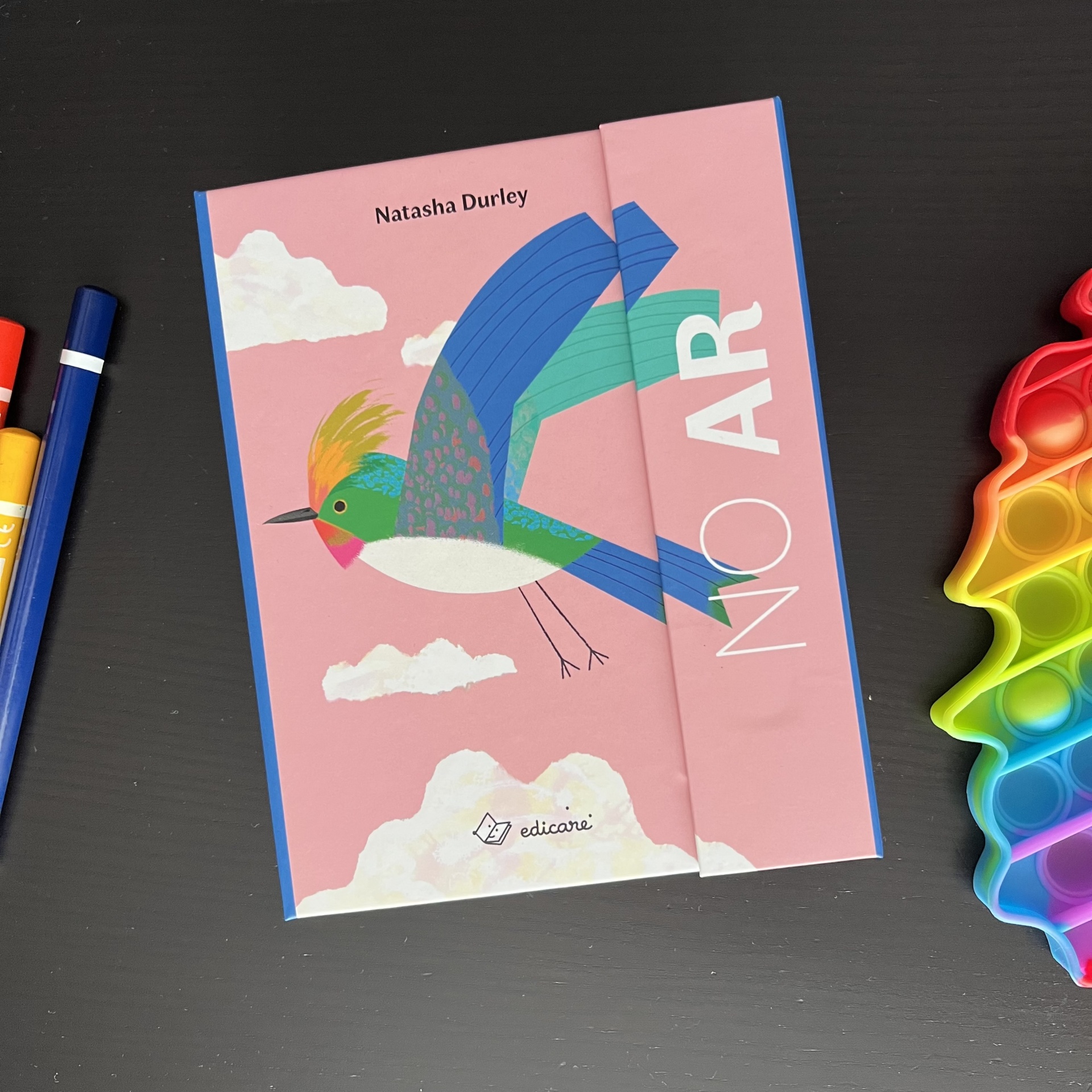 No Ar - Livro Acordeão