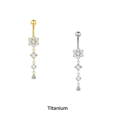Joia de Titânio para umbigo com flor de zirconias e pendente de 3 zirconias formas TN064