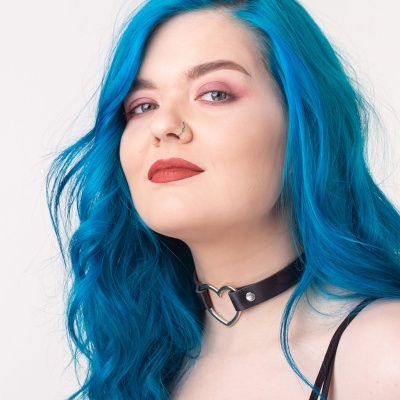 Argola sem fim  em aço cirúrgico torcida com bolinha -  RSF11