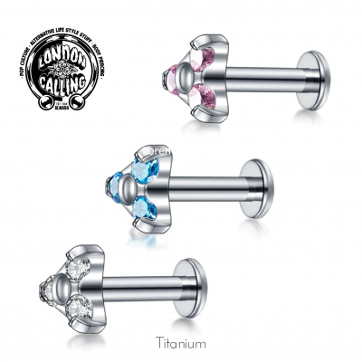 Jóia (labret) de Titânio G23 com flor de 3 pétalas de zircónias TL100 Jóia (labret) de Titânio G23 com flor de 3 pétalas de zircónias TL100