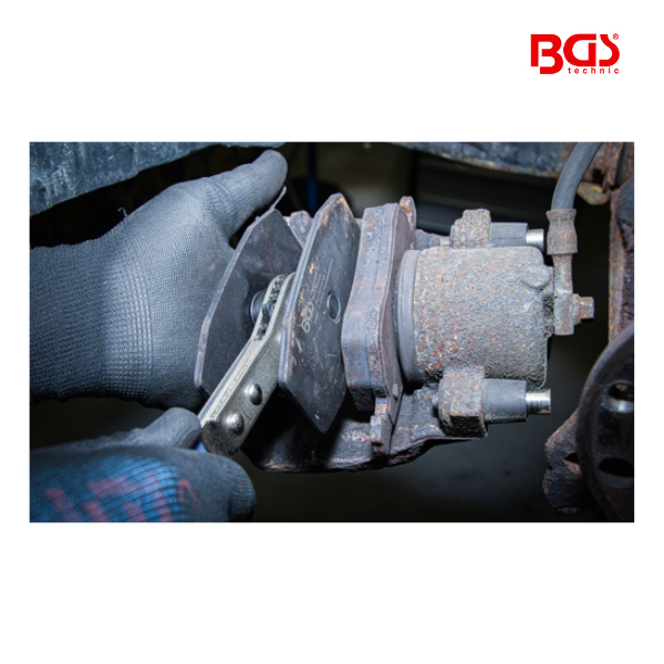 Reposionador de travões com roquete