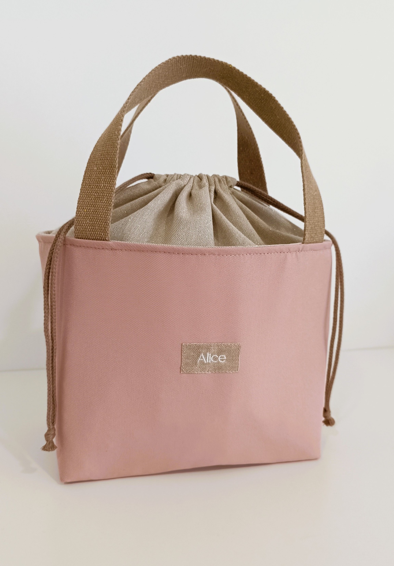 Lancheira térmica rosa bebé + alças bege escuro