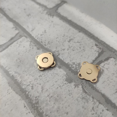 Fecho magnético coser