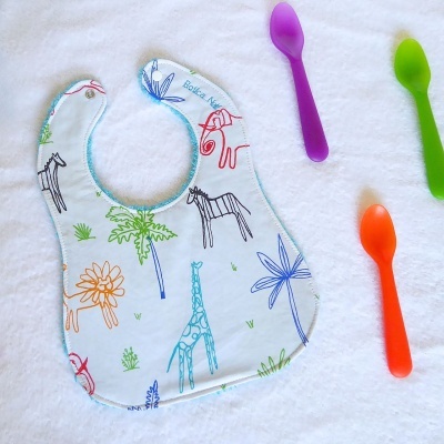 Babetes em Tecido Babetes em Tecido