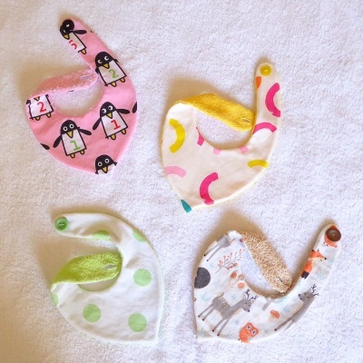 Babetes em Tecido Babetes em Tecido