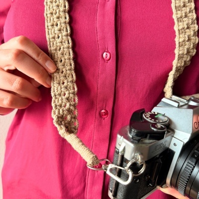 https://www.murta.eco/product/alca-em-macrame-para-maquina-fotografica-ou-bolsa