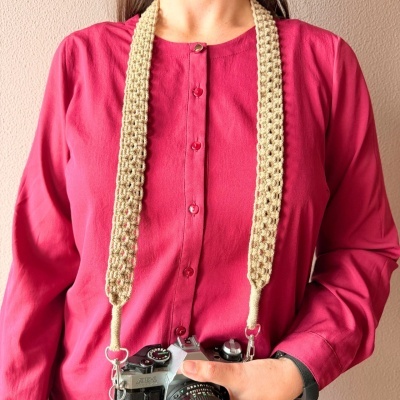 https://www.murta.eco/product/alca-em-macrame-para-maquina-fotografica-ou-bolsa