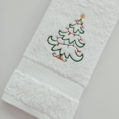 https://www.nicolalopes.pt/product/toalha-de-rosto-arvore-de-natal