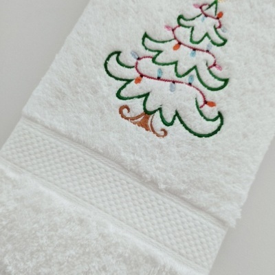 https://www.nicolalopes.pt/product/toalha-de-rosto-arvore-de-natal