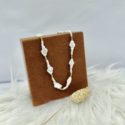 Colar perolas e dourado