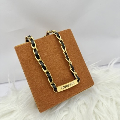 Colar Dourado com Polipele Preta "FOREVER"