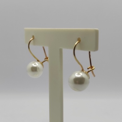 Brincos de ouro com pérolas