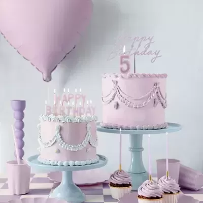 Velas lilás e dourado