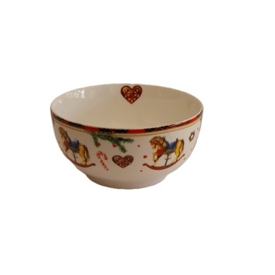 Taça de cereais com cavalo de baloiço e outros motivos de Natal.