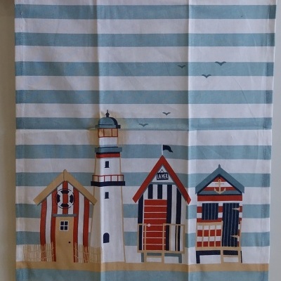 Pano de cozinha com motivos marítimos.