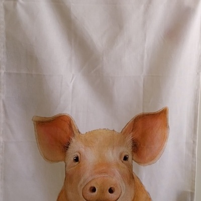 Pano de cozinha com um porco.