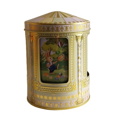 Lata caixa de música com motivos de Páscoa.