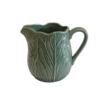 Leiteira em porcelana.