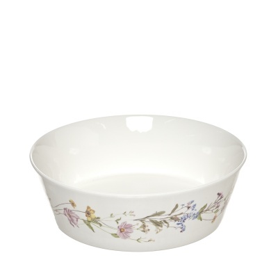 Taça em porcelana decorada com flores.