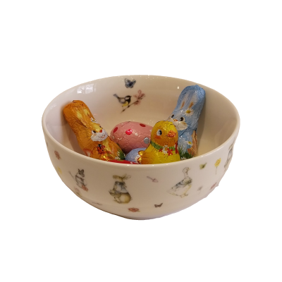 Taça de cereais com coelhos e outros motivos de Páscoa.