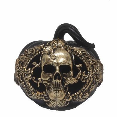 Abóbora com caveira esculpida