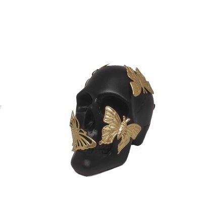 Caveira com borboletas