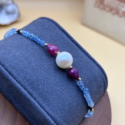 Pulseira em Ouro Amarelo 18K com Pérola Akoya, Safira Azul, Rubi e Água-Marinha